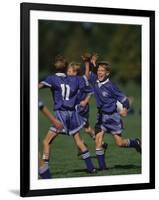 11 Year Old Boys Soccer Player Celebates a Goal-null-Framed Photographic Print