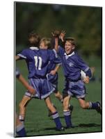 11 Year Old Boys Soccer Player Celebates a Goal-null-Mounted Photographic Print