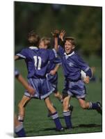 11 Year Old Boys Soccer Player Celebates a Goal-null-Mounted Photographic Print