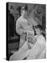 12 Year Old Boy Sitting in Barber Chair Having His Hair Cut and Reading Comics-Alfred Eisenstaedt-Stretched Canvas