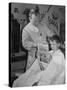 12 Year Old Boy Sitting in Barber Chair Having His Hair Cut and Reading Comics-Alfred Eisenstaedt-Stretched Canvas