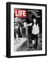 12-Year-Old Vietnamese Girl Nguyen Thi Tron Watching New Wooden Leg Being Made, November 8, 1968-Larry Burrows-Framed Photographic Print