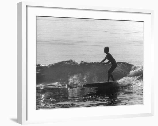 16 Yr. Old Surfer Kathy Kohner Riding a Wave-Allan Grant-Framed Premium Photographic Print