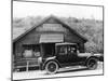 1916 Cadillac V8 Car, Parked Outside a General Store, USA, (C.191)-null-Mounted Photographic Print