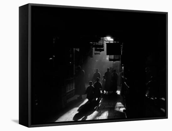 1920s-1930s Silhouetted People Mysterious Orient Dramatic Moody Backlit Street Scene in Old China-null-Framed Stretched Canvas