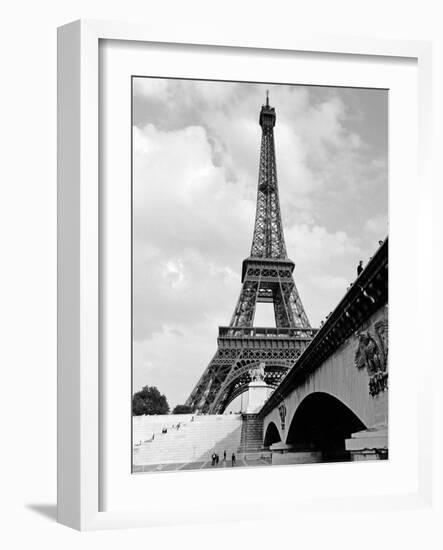 1920s Eiffel Tower with People Walking Up Stairs and Standing on Bridge in Foreground-null-Framed Photographic Print