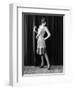 1920s FLAPPER WOMAN POSING HAND ON HIP HOLDING STRING OF PEARLS STRETCHING LEG CHECKING HOSIERY...-Panoramic Images-Framed Photographic Print