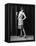 1920s FLAPPER WOMAN POSING HAND ON HIP HOLDING STRING OF PEARLS STRETCHING LEG CHECKING HOSIERY...-Panoramic Images-Framed Stretched Canvas