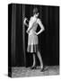 1920s FLAPPER WOMAN POSING HAND ON HIP HOLDING STRING OF PEARLS STRETCHING LEG CHECKING HOSIERY...-Panoramic Images-Stretched Canvas