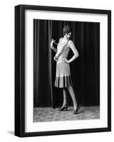 1920s FLAPPER WOMAN POSING HAND ON HIP HOLDING STRING OF PEARLS STRETCHING LEG CHECKING HOSIERY...-Panoramic Images-Framed Photographic Print