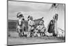 1920s FOUR NATIVE AMERICAN STONEY SIOUX INDIAN MEN ASSEMBLED BESIDE TEPEE WEARING FULL EAGLE FEA...-H. Armstrong Roberts-Mounted Photographic Print