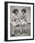 1920s TWO LITTLE GIRLS SITTING ON BENCH EATING ICE CREAM CONES AND TALKING-Panoramic Images-Framed Photographic Print