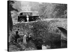 1930 Triumph Super 7 on a Stone Bridge in Rural England, 1930's-null-Stretched Canvas