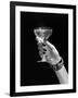 1930s 1940s 1950s WOMAN HAND ORNATE METAL BRACELET HOLDING UP NEW YEAR TOAST GLASS OF CHAMPAGNE...-Panoramic Images-Framed Photographic Print