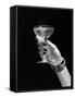 1930s 1940s 1950s WOMAN HAND ORNATE METAL BRACELET HOLDING UP NEW YEAR TOAST GLASS OF CHAMPAGNE...-Panoramic Images-Framed Stretched Canvas