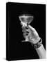 1930s 1940s 1950s WOMAN HAND ORNATE METAL BRACELET HOLDING UP NEW YEAR TOAST GLASS OF CHAMPAGNE...-Panoramic Images-Stretched Canvas