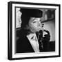 1930s 1940s ELEGANT UPSCALE WOMAN WEARING HAT WITH VEIL SNIFFING BOTTLE OF WHIMSY PERFUME-Panoramic Images-Framed Photographic Print