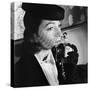 1930s 1940s ELEGANT UPSCALE WOMAN WEARING HAT WITH VEIL SNIFFING BOTTLE OF WHIMSY PERFUME-Panoramic Images-Stretched Canvas