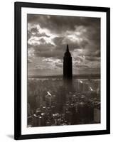 1930s-1940s Empire State Building Silhouetted Against High Gathering Storm Clouds Covering NYC-null-Framed Photographic Print