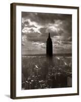 1930s-1940s Empire State Building Silhouetted Against High Gathering Storm Clouds Covering NYC-null-Framed Photographic Print