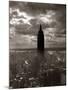 1930s-1940s Empire State Building Silhouetted Against High Gathering Storm Clouds Covering NYC-null-Mounted Photographic Print