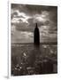 1930s-1940s Empire State Building Silhouetted Against High Gathering Storm Clouds Covering NYC-null-Framed Photographic Print