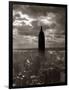 1930s-1940s Empire State Building Silhouetted Against High Gathering Storm Clouds Covering NYC-null-Framed Photographic Print