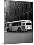 1930s-1940s Public Transportation Trackless Trolley Electric Bus About to Round Street Corner-null-Mounted Photographic Print