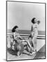 1930s 1940s TWO WOMEN SITTING ON HOTEL DECK BEACH SIDE IN ONE PIECE BATHING SUIT FASHION FLORIDA...-Panoramic Images-Mounted Photographic Print