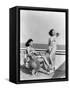 1930s 1940s TWO WOMEN SITTING ON HOTEL DECK BEACH SIDE IN ONE PIECE BATHING SUIT FASHION FLORIDA...-Panoramic Images-Framed Stretched Canvas