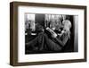 1930s BLOND WOMAN SITTING BY WINDOW READING MAGAZINE PROFILE VIEW PLANTS IN BACKGROUND WINDOW SEAT-H. Armstrong Roberts-Framed Photographic Print