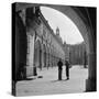 1930s FASHIONABLE ANONYMOUS COUPLE STANDING IN COURTYARD OF AN OLD CASTLE DRESDEN GERMANY-Panoramic Images-Stretched Canvas