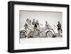 1930s GROUP OF MEN AND WOMEN WEARING BATHING SUITS CASUAL CLOTHES ON BICYCLES IN A CAR ON BEACH...-H. Armstrong Roberts-Framed Photographic Print