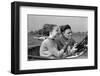1930s MAN DRIVING CONVERTIBLE AUTOMOBILE WHILE GIRLFRIEND LIGHTS HIS CIGARETTE-H. Armstrong Roberts-Framed Photographic Print
