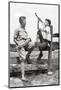 1930s TWO BOYS SITTING ON SPLIT RAIL FENCE WEARING KNICKERS HIGH TOP SNEAKERS PRACTICING PLAYING...-H. Armstrong Roberts-Mounted Photographic Print
