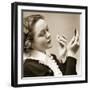 1930s WOMAN POWDERING HER NOSE LOOKING INTO COMPACT MIRROR HOLDING POWDER PUFF WEARING TOP WITH...-Panoramic Images-Framed Photographic Print
