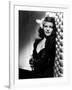 , 1940: American actress Rita Hayworth (1918 - 1987) with an exotic flower in her hair (Photo by A.-null-Framed Photo