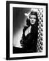 , 1940: American actress Rita Hayworth (1918 - 1987) with an exotic flower in her hair (Photo by A.-null-Framed Photo