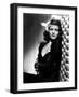 , 1940: American actress Rita Hayworth (1918 - 1987) with an exotic flower in her hair (Photo by A.-null-Framed Photo