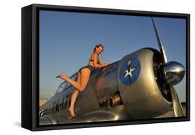 1940's Pin-Up Girl Standing on the Wing of a World War II T-6 Texan-null-Framed Stretched Canvas