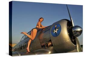 1940's Pin-Up Girl Standing on the Wing of a World War II T-6 Texan-null-Stretched Canvas