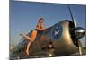 1940's Pin-Up Girl Standing on the Wing of a World War II T-6 Texan-null-Mounted Premium Photographic Print