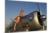 1940's Pin-Up Girl Standing on the Wing of a World War II T-6 Texan-null-Mounted Photographic Print