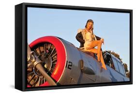1940's Style Aviator Pin-Up Girl Posing with a Vintage T-6 Texan Aircraft-null-Framed Stretched Canvas