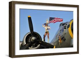 1940's Style Majorette Pin-Up Girl on a B-17 Bomber with an American Flag-null-Framed Photographic Print