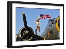 1940's Style Majorette Pin-Up Girl on a B-17 Bomber with an American Flag-null-Framed Photographic Print