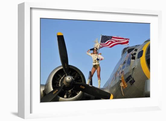 1940's Style Majorette Pin-Up Girl on a B-17 Bomber with an American Flag-null-Framed Photographic Print