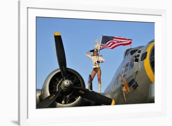 1940's Style Majorette Pin-Up Girl on a B-17 Bomber with an American Flag-null-Framed Photographic Print