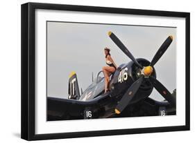 1940's Style Navy Pin-Up Girl Sitting on a Vintage Corsair Fighter Plane-null-Framed Premium Photographic Print