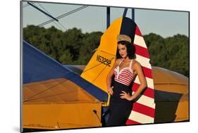 1940's Style Pin-Up Girl Leaning on the Tail Fin of a Stearman Biplane-null-Mounted Photographic Print